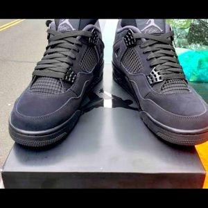 Black cat Air Jordan 4s